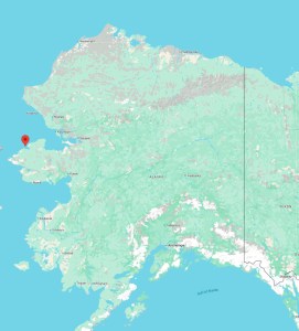 A map of Alaska showing a red dot along the west coast to note Shishmaref.